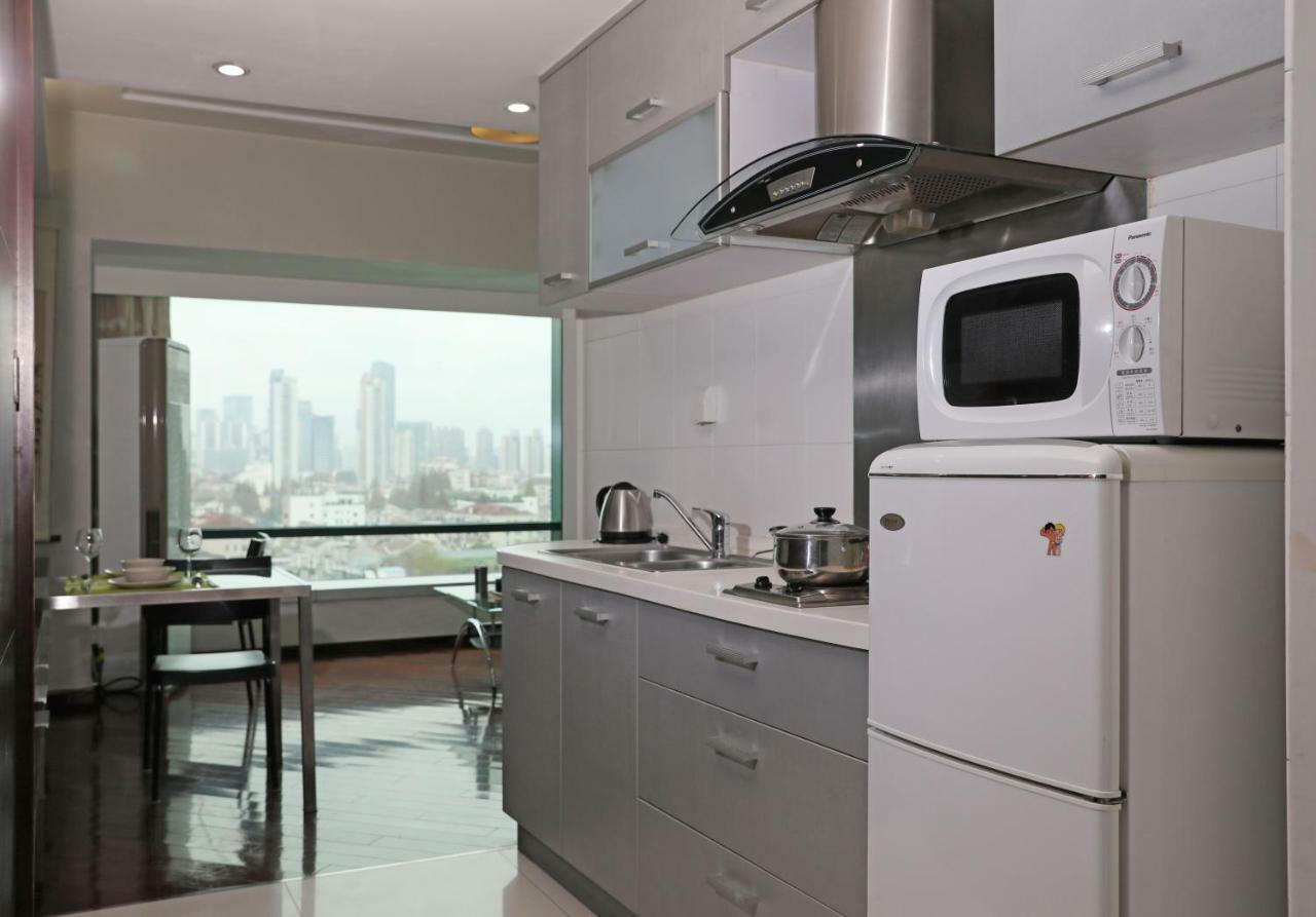 Shanghai Cosmo World Union Service Apartment Xangai Exterior foto