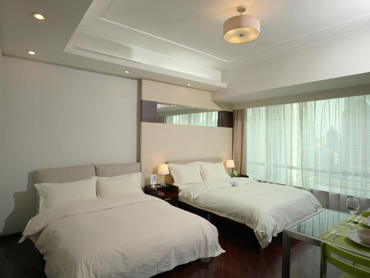 Shanghai Cosmo World Union Service Apartment Xangai Exterior foto
