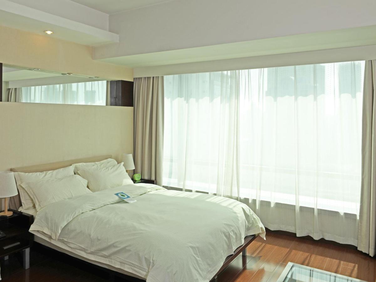Shanghai Cosmo World Union Service Apartment Xangai Exterior foto