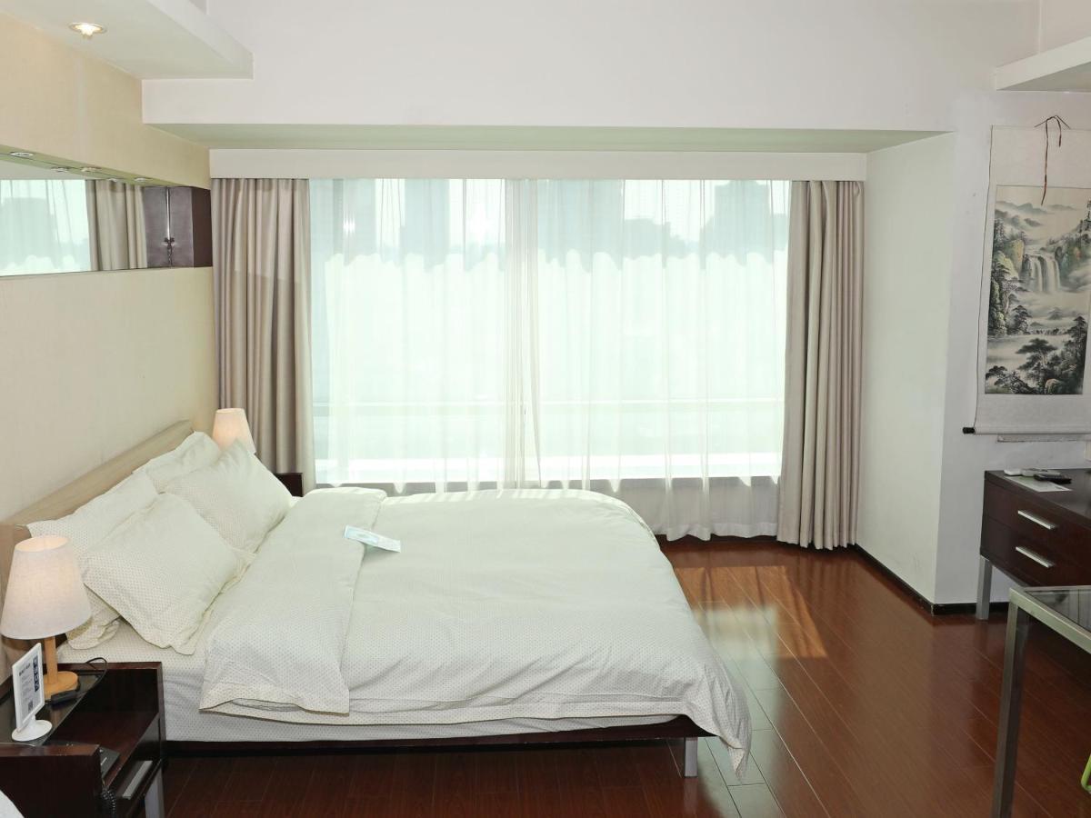 Shanghai Cosmo World Union Service Apartment Xangai Exterior foto