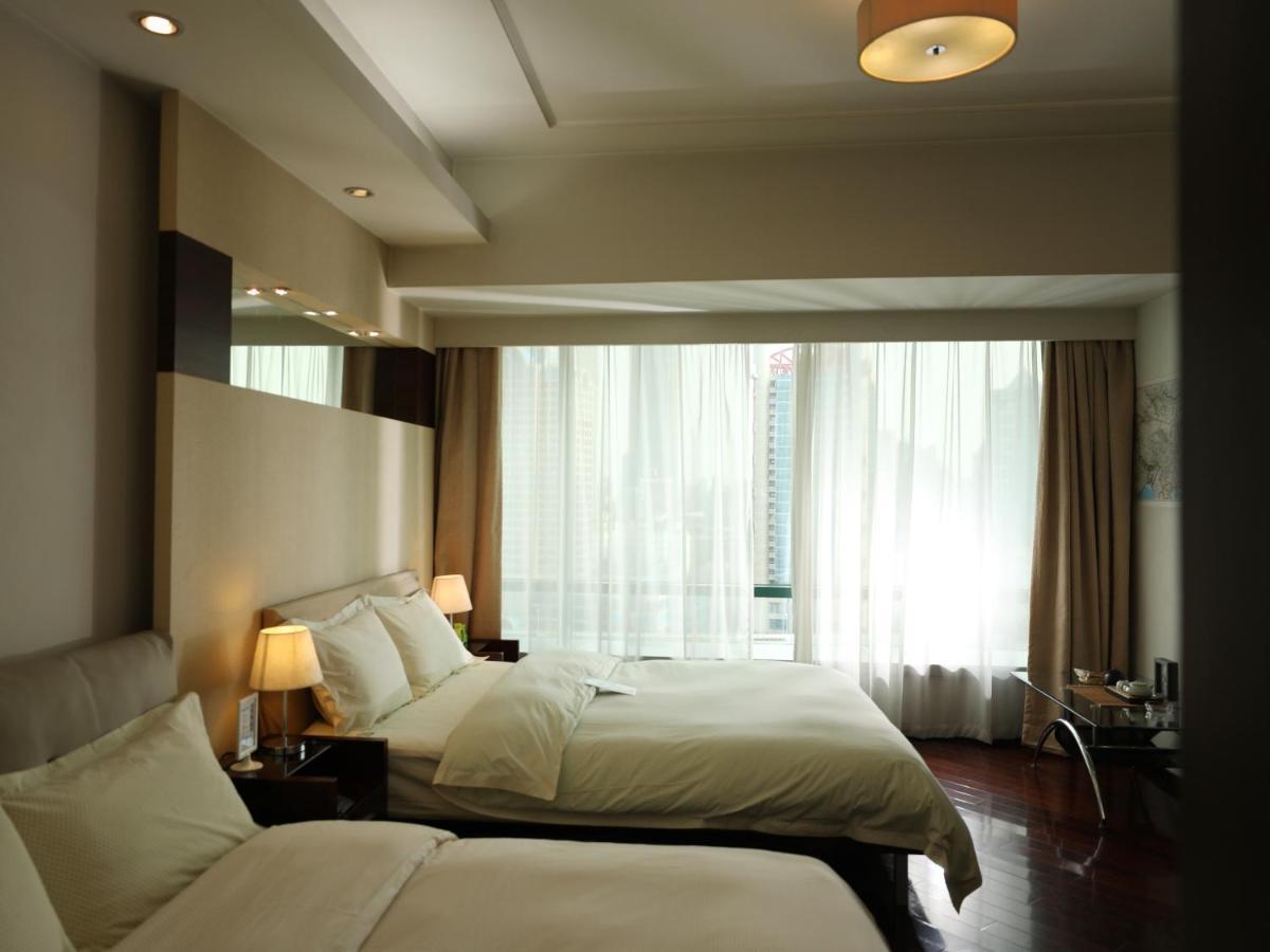Shanghai Cosmo World Union Service Apartment Xangai Exterior foto